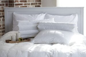 letto piumone cuscini
