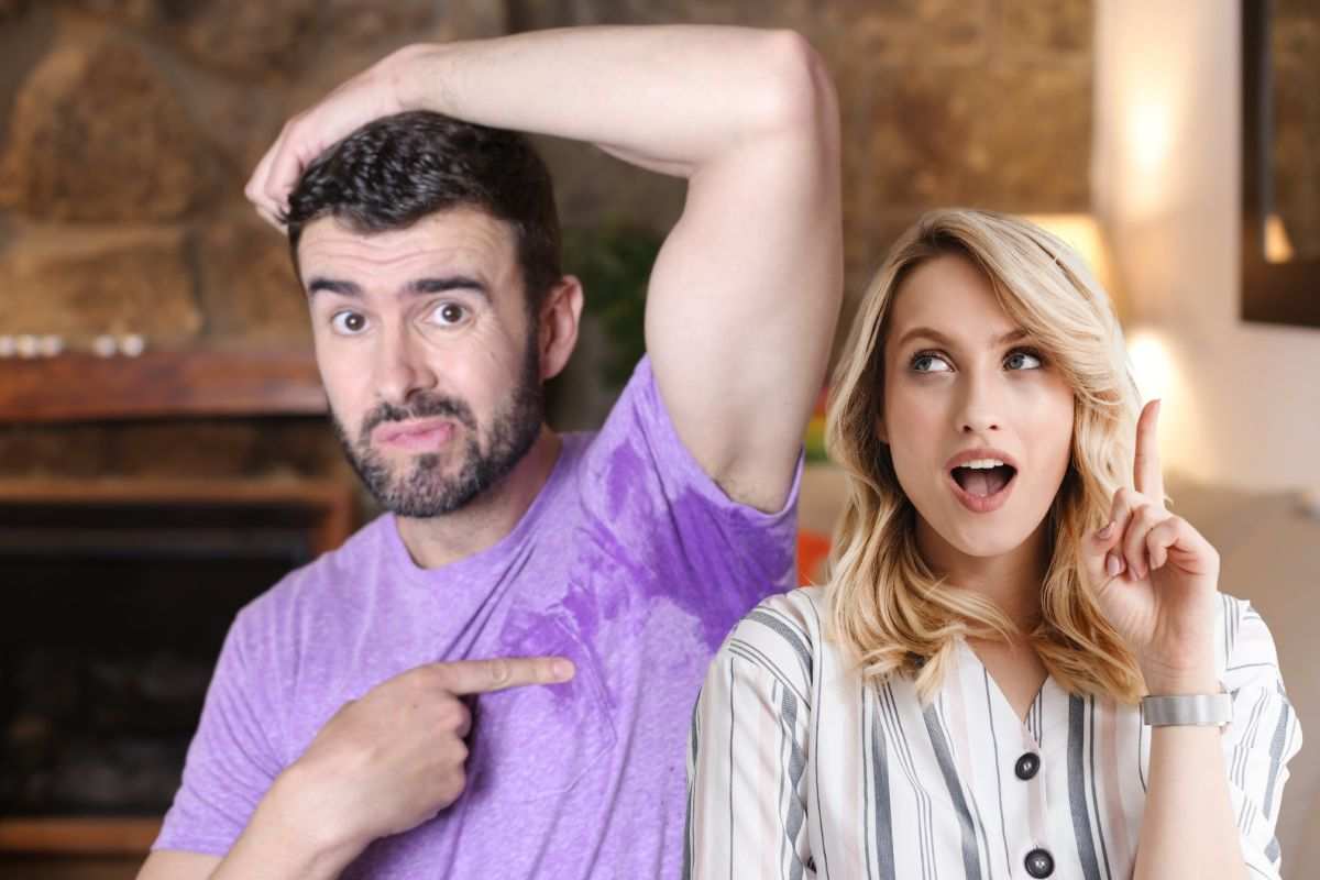 donna con un'idea e uomo che mostra la macchia di sudore sotto la maglia